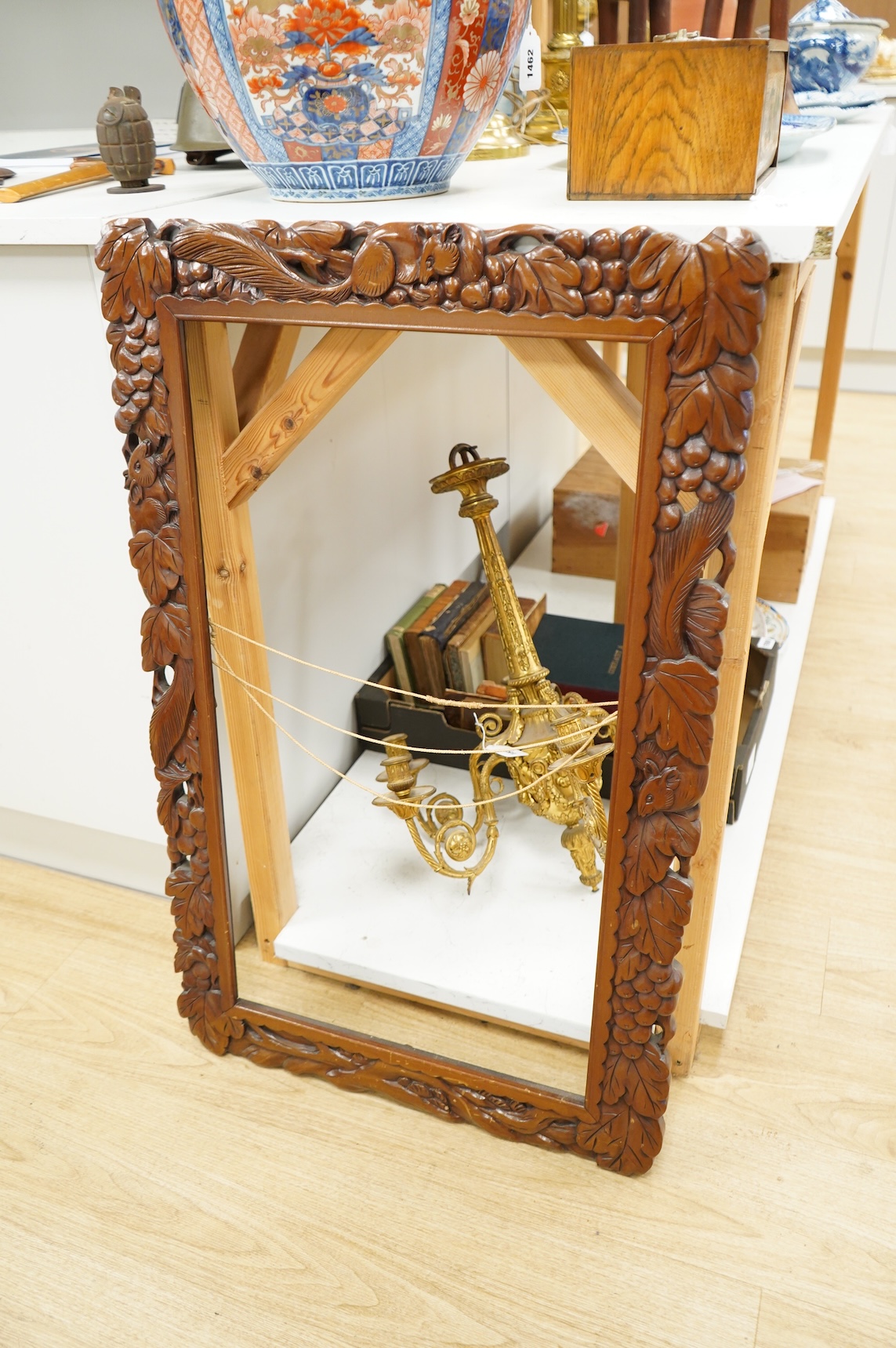 Two picture frames to include a carved wood example, aperture size 74 x 41cm